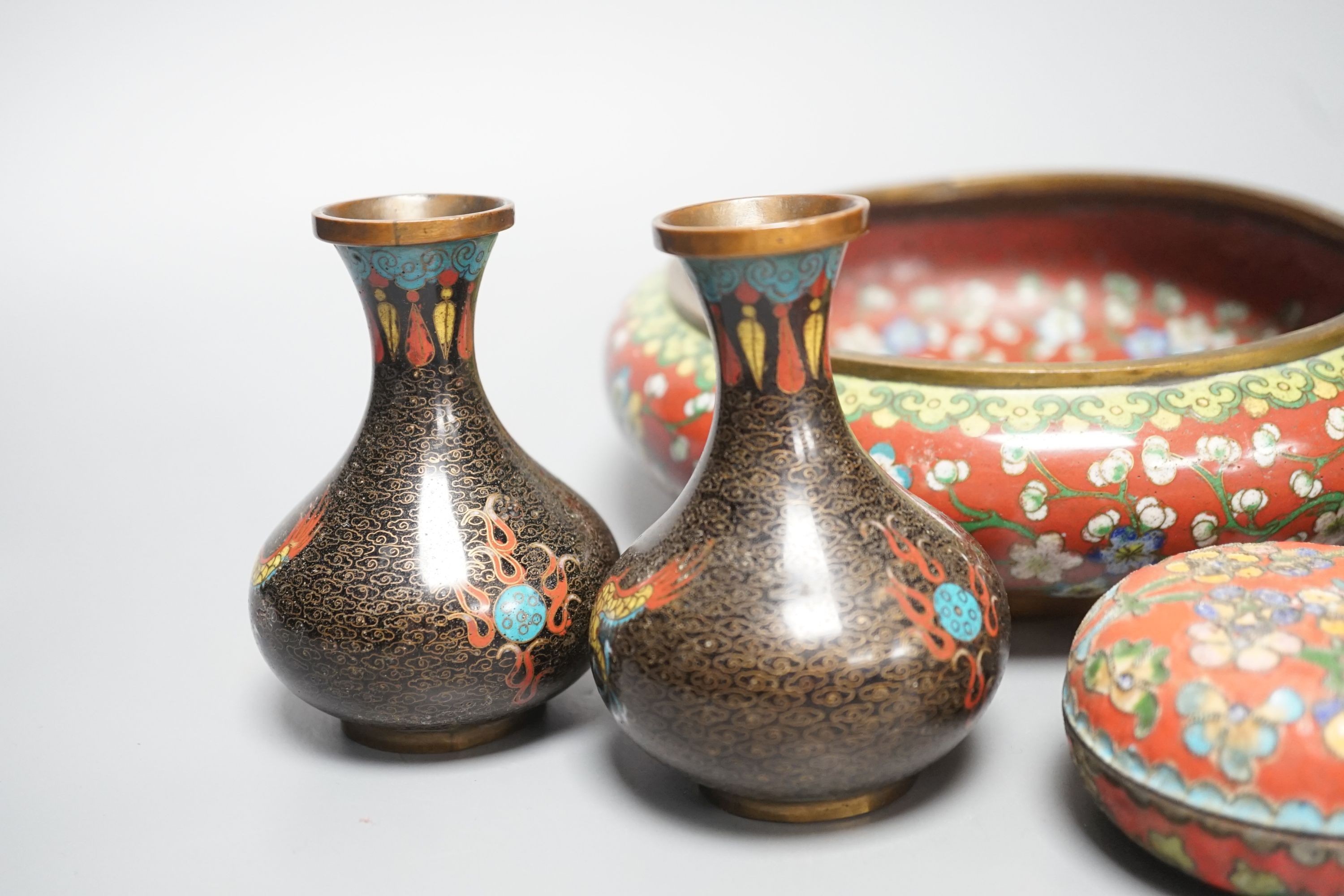 A group of Chinese cloisonné enamel dishes, boxes and a pair of vases, early 20th century and later, largest diameter 17cm